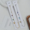 The colorful heart-shaped gold bracelet is adjustable and versatile for giving as a gift full image